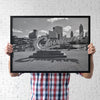 Hang stunning, timeless art in your home with this iconic CLEVELAND SIGN - B&W - 24”x36” gallery print. Boasting a classic black-and-white skyline, this striking landmark will elevate any living space while capturing the essence of Cleveland. Expertly printed on fine art paper, this piece is ready to hang for effortless display in your bedroom, game room, or rec room. Add a touch of charisma and character today! Also available as a ﻿Canvas Wrap.  Note: frame is not included  Designer: @makkersmedia