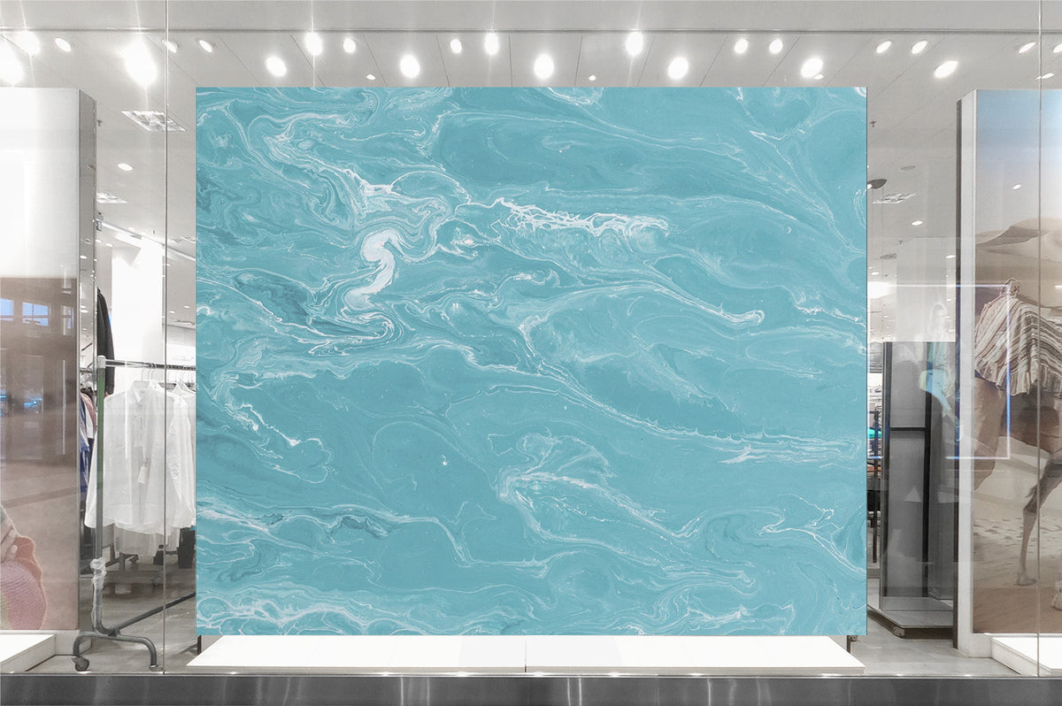 Bring the tranquility of the Mediterranean Sea to your living and working spaces with the BLUE WAVE WALL MURAL. This mural features a textured, wave-like pattern in a soothing shade of blue, making it an ideal wall treatment for residential and commercial settings. Boasting either a traditional unpasted or self-adhesive and repositionable wallpaper, this wallcovering adds refined beauty to your décor.