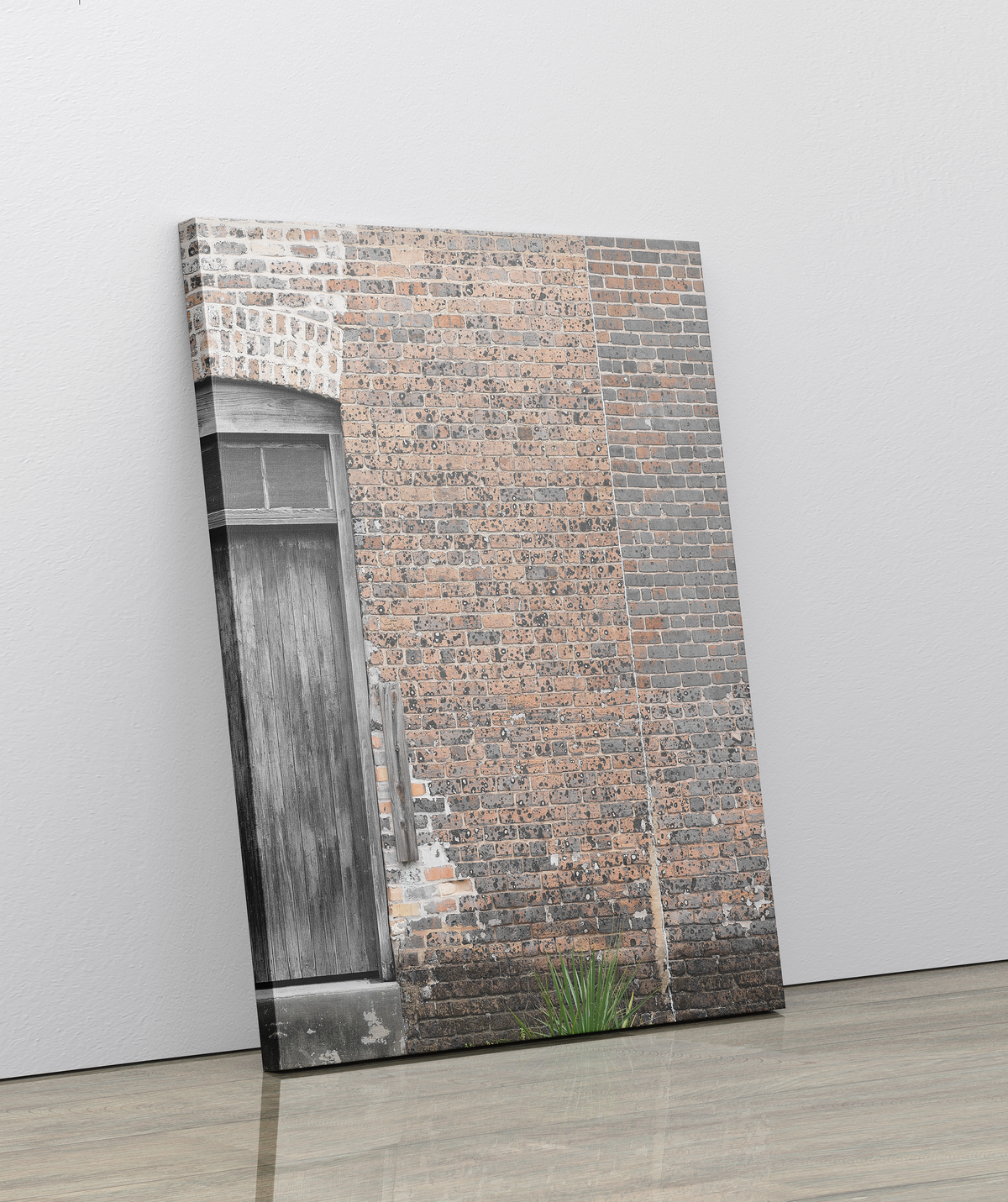 Detailed image of brick wall with distressed wood door.   NOTES:  Brick Wall Image  Distressed Wood Door Made to Order Designer: @Makkersmedia BACKDROP:  Produced in-house. Printing by HP commercial wide-format printers. MATERIAL:  Aurora Expressions Poly/Cotton Canvas with Satin/Matte Finish  Base Color: White